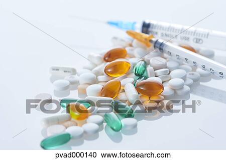 Pills and siringe View Large Photo Image Stock Image - Pills and siringe. Fotosearch