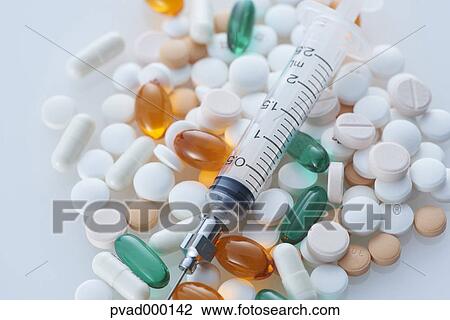Pills and siringe View Large Photo Image Stock Image - Pills and siringe. Fotosearch