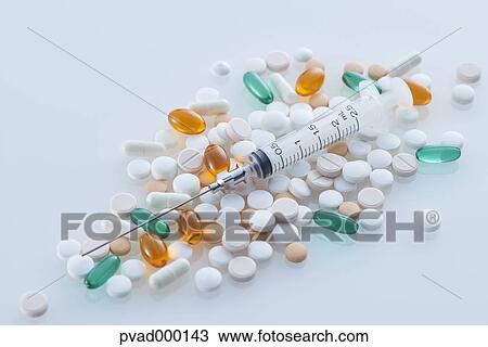 Pills and siringe View Large Photo Image Stock Image - Pills and siringe. Fotosearch