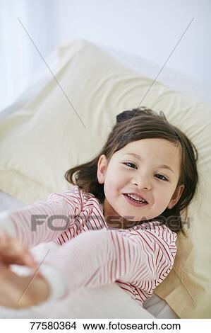 Sick Japanese kid in bed View Large Photo Image Picture - Sick Japanese kid in bed. Fotosearch