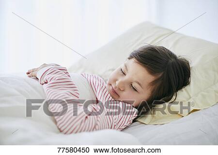 Sick Japanese kid in bed View Large Photo Image Stock Image - Sick Japanese kid in bed. Fotosearch