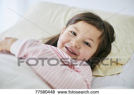 Sick Japanese kid in bed View Large Photo Image Stock Photo - Sick Japanese kid in bed. Fotosearch