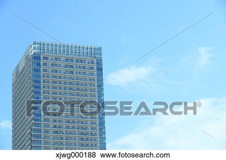 Stock Photo - Skyscraper and blue sky, Tokyo, Japan. Fotosearch