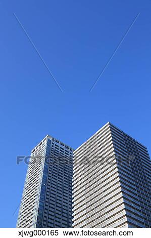 Skyscraper and blue sky, Tokyo, Japan View Large Photo Image Stock Photography - Skyscraper and blue sky, Tokyo, Japan. Fotosearch