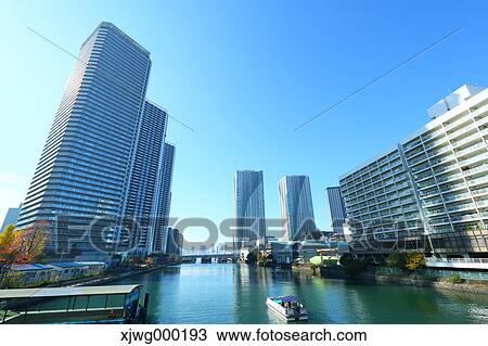 Stock Image - Skyscrapers and blue sky, Tokyo, Japan. Fotosearch