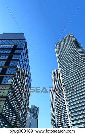 Skyscrapers and blue sky, Tokyo, Japan View Large Photo Image Stock Photo - Skyscrapers and blue sky, Tokyo, Japan. Fotosearch