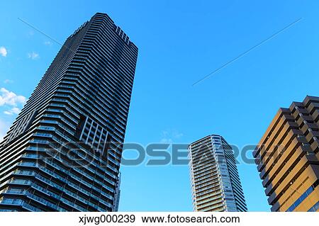 Skyscrapers and blue sky, Tokyo, Japan View Large Photo Image Stock Photo - Skyscrapers and blue sky, Tokyo, Japan. Fotosearch