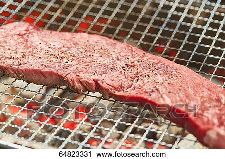 Steak on grill View Large Photo Image Stock Image - Steak on grill. Fotosearch