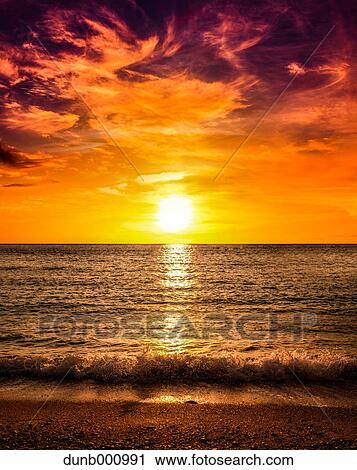 Sunset on the beach View Large Photo Image Stock Image - Sunset on the beach. Fotosearch