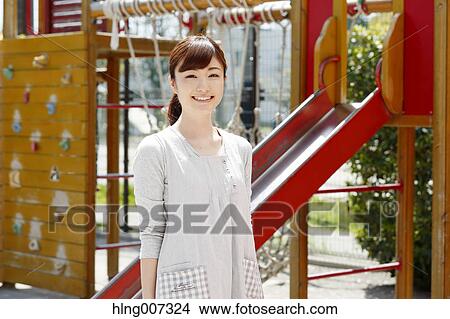 Picture - Teacher at Japanese kindergarten. Fotosearch