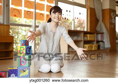 Teacher at Japanese kindergarten View Large Photo Image Stock Image - Teacher at Japanese kindergarten. Fotosearch