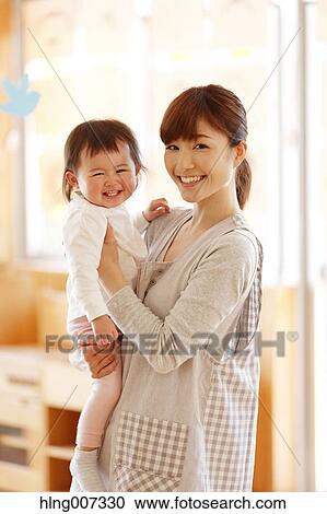 Teacher with kid at Japanese kindergarten View Large Photo Image Stock Image - Teacher with kid at Japanese kindergarten. Fotosearch