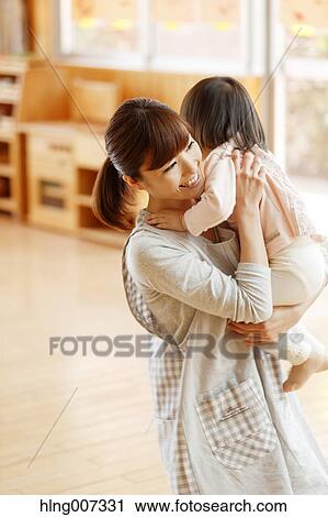 Teacher with kid at Japanese kindergarten View Large Photo Image Stock Image - Teacher with kid at Japanese kindergarten. Fotosearch