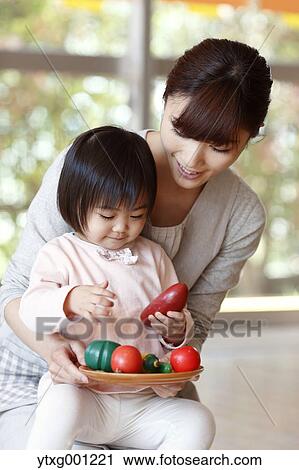 Teacher with kid at Japanese kindergarten View Large Photo Image Stock Image - Teacher with kid at Japanese kindergarten. Fotosearch