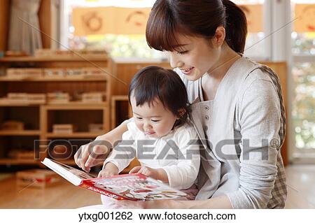 Teacher with kid at Japanese kindergarten View Large Photo Image Stock Image - Teacher with kid at Japanese kindergarten. Fotosearch