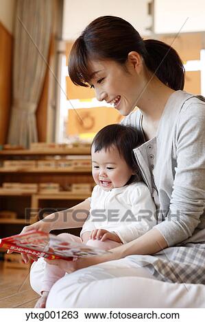 Teacher with kid at Japanese kindergarten View Large Photo Image Stock Image - Teacher with kid at Japanese kindergarten. Fotosearch