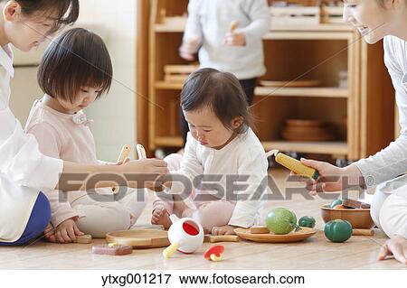 Teachers with kids at Japanese kindergarten View Large Photo Image Stock Photo - Teachers with kids at Japanese kindergarten. Fotosearch