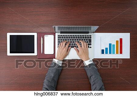 Top view of Japanese businessman in the office View Large Photo Image Stock Photo - Top view of Japanese businessman in the office. Fotosearch