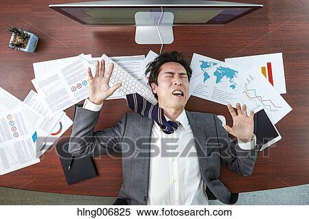 Top view of Japanese businessman in the office View Large Photo Image Stock Photography - Top view of Japanese businessman in the office. Fotosearch