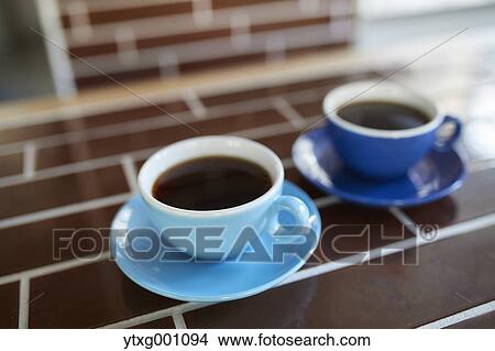 Two cups of coffee View Large Photo Image Picture - Two cups of coffee. Fotosearch