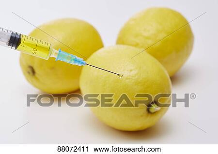 Stock Image - Vitamin injection. Fotosearch