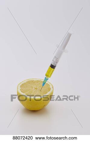 Stock Image - Vitamin injection. Fotosearch