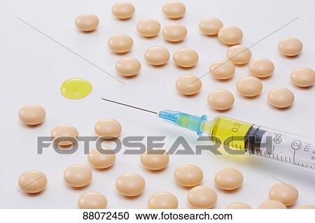 Stock Image - Vitamin injection. Fotosearch