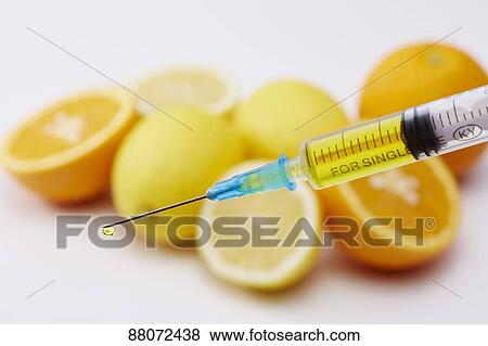 Stock Photo - Vitamin injection. Fotosearch