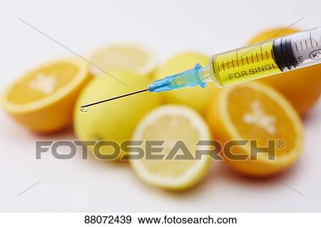 Vitamin injection View Large Photo Image Stock Photo - Vitamin injection. Fotosearch
