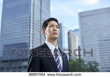 Young Japanese businessman View Large Photo Image Picture - Young Japanese businessman. Fotosearch