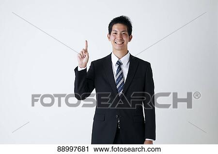 Young Japanese businessman View Large Photo Image Stock Image - Young Japanese businessman. Fotosearch