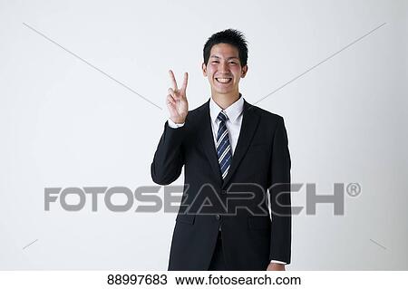 Stock Image - Young Japanese businessman. Fotosearch