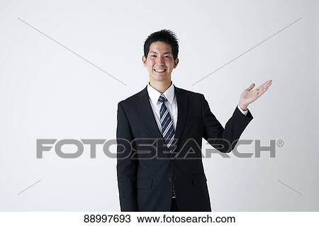 Stock Image - Young Japanese businessman. Fotosearch