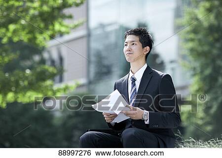 Stock Photograph - Young Japanese businessman. Fotosearch