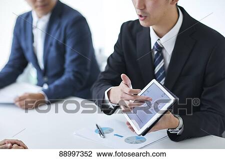 Young Japanese businesspeople View Large Photo Image Stock Image - Young Japanese businesspeople. Fotosearch