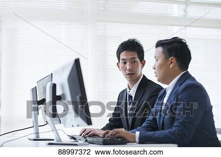 Young Japanese businesspeople View Large Photo Image Stock Image - Young Japanese businesspeople. Fotosearch