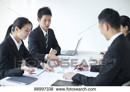 Stock Photo - Young Japanese businesspeople. Fotosearch