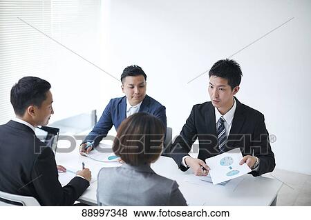 Stock Photo - Young Japanese businesspeople. Fotosearch
