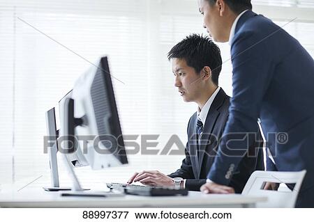 Young Japanese businesspeople View Large Photo Image Stock Photo - Young Japanese businesspeople. Fotosearch
