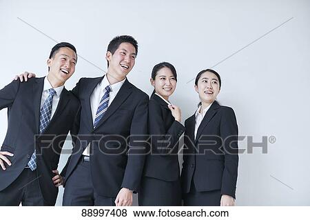 Stock Photo - Young Japanese businesspeople. Fotosearch