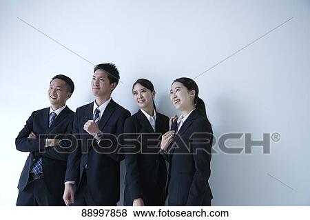Stock Photo - Young Japanese businesspeople. Fotosearch