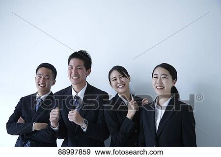 Stock Photo - Young Japanese businesspeople. Fotosearch