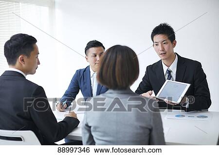 Young Japanese businesspeople View Large Photo Image Stock Photograph - Young Japanese businesspeople. Fotosearch