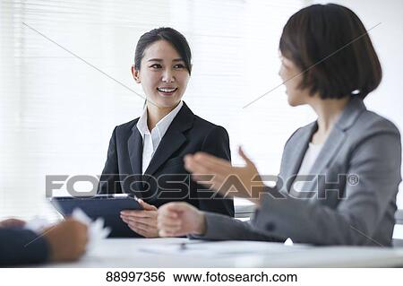 Young Japanese businesspeople View Large Photo Image Stock Photograph - Young Japanese businesspeople. Fotosearch