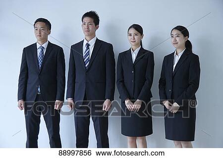 Stock Photograph - Young Japanese businesspeople. Fotosearch