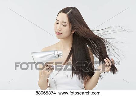 Young Japanese model with beautiful hair View Large Photo Image Picture - Young Japanese model with beautiful hair. Fotosearch