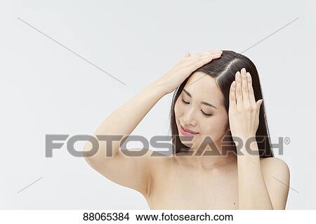 Young Japanese model with beautiful hair View Large Photo Image Picture - Young Japanese model with beautiful hair. Fotosearch