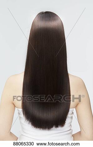 Stock Image - Young Japanese model with beautiful hair. Fotosearch