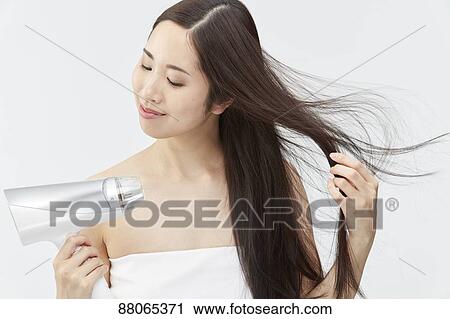 Young Japanese model with beautiful hair View Large Photo Image Stock Image - Young Japanese model with beautiful hair. Fotosearch