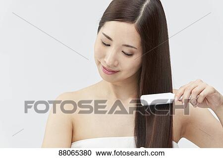 Young Japanese model with beautiful hair View Large Photo Image Stock Image - Young Japanese model with beautiful hair. Fotosearch